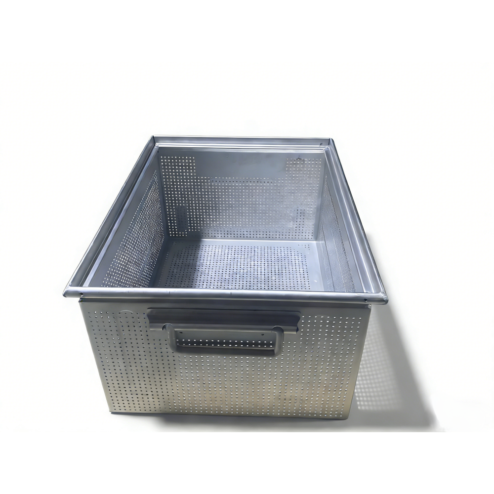 Interior view of an AUKE perforated cleaning basket showing the first hole rows beside formed edges